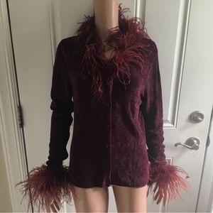 Maroon front button sweater. Detachable feather trim.